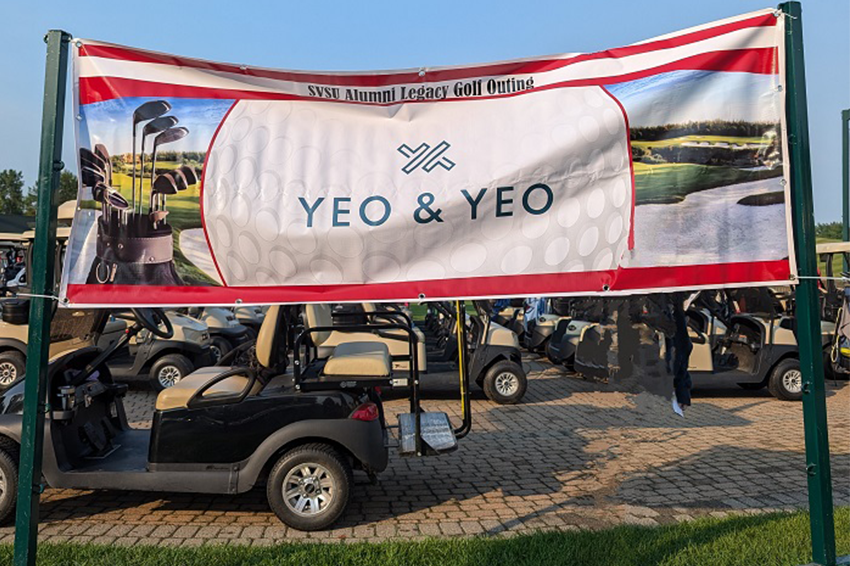 Yeo & Yeo sign for sponsoring the Alumni Legacy Golf Outing
